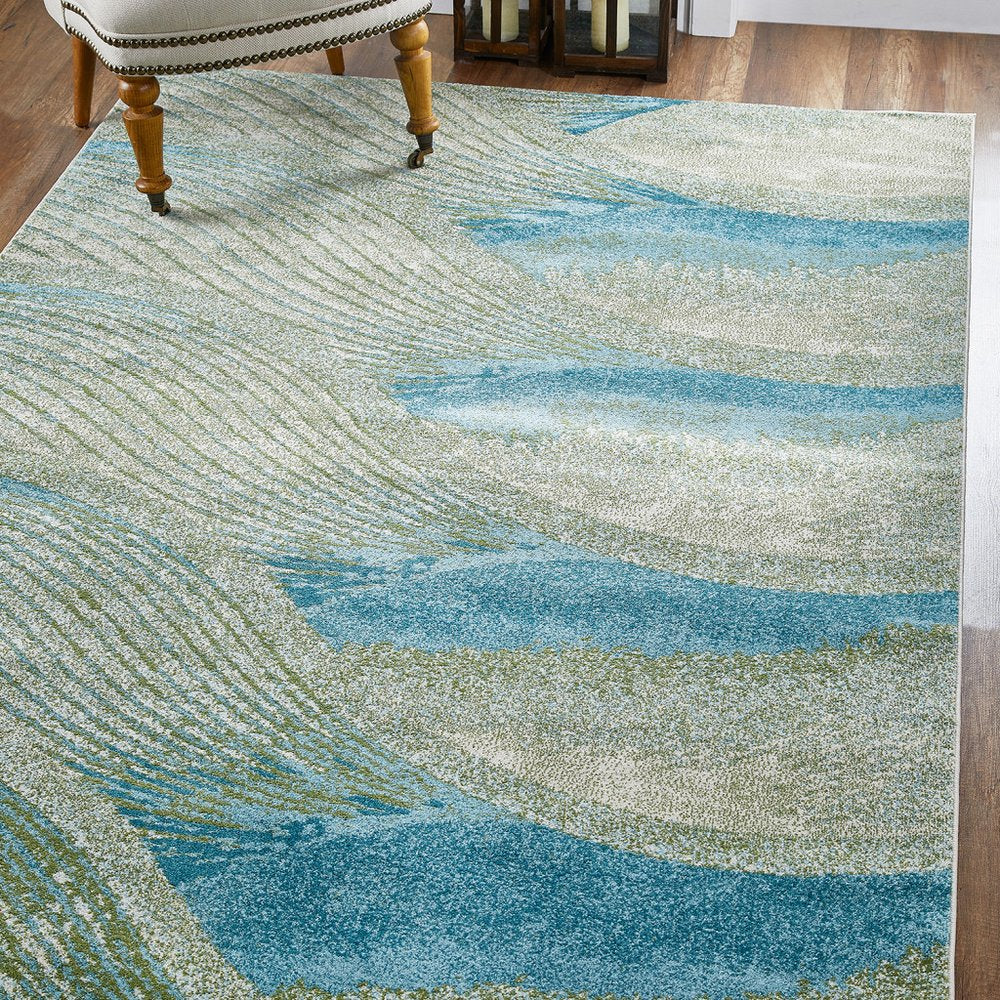5' X 8' Beige Blue And Sage Abstract Area Rug
