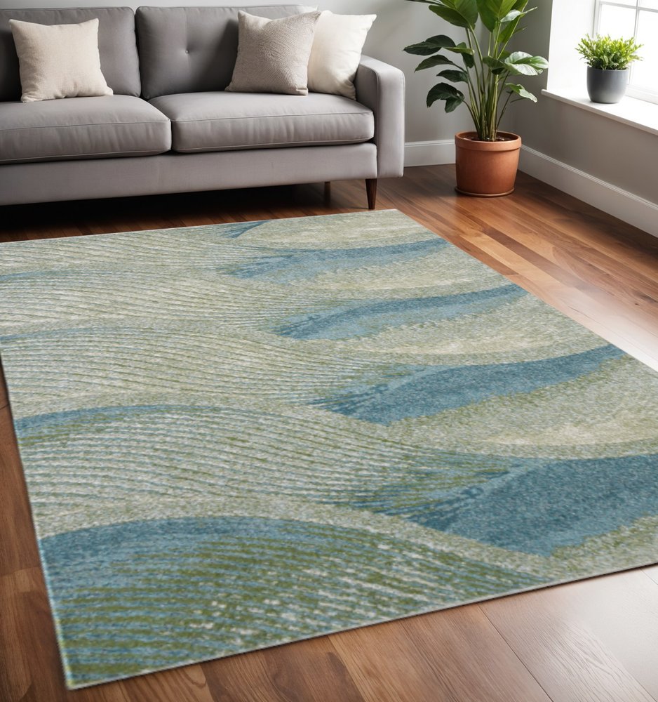 5' X 8' Beige Blue And Sage Abstract Area Rug