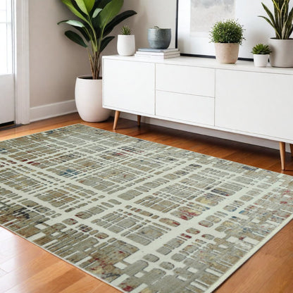 4' X 6' Ivory Red And Blue Abstract Area Rug