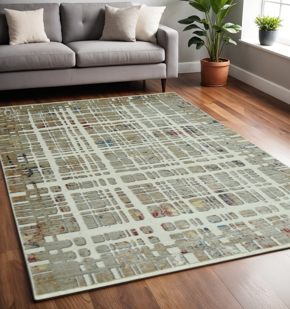 5' X 8' Ivory Red And Blue Abstract Area Rug