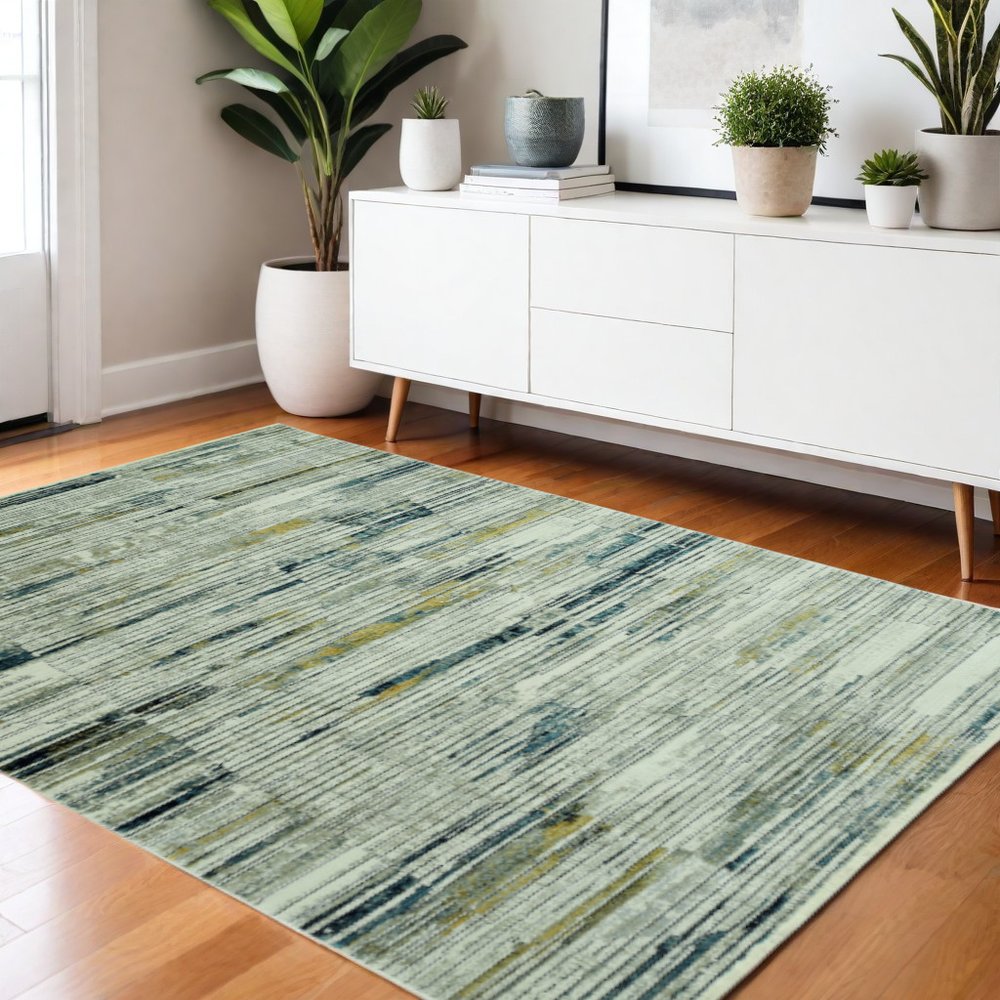 4' X 6' Ivory And Blue Abstract Area Rug