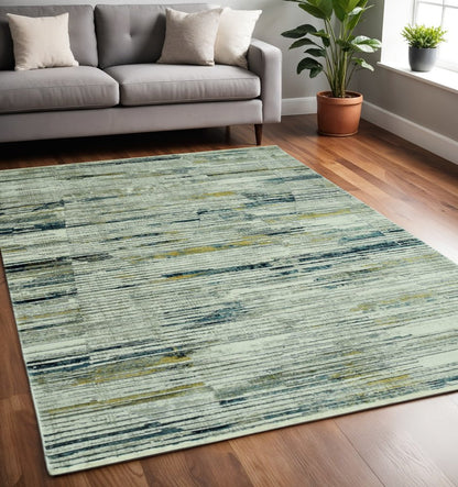 5' X 8' Ivory and Blue Abstract Area Rug