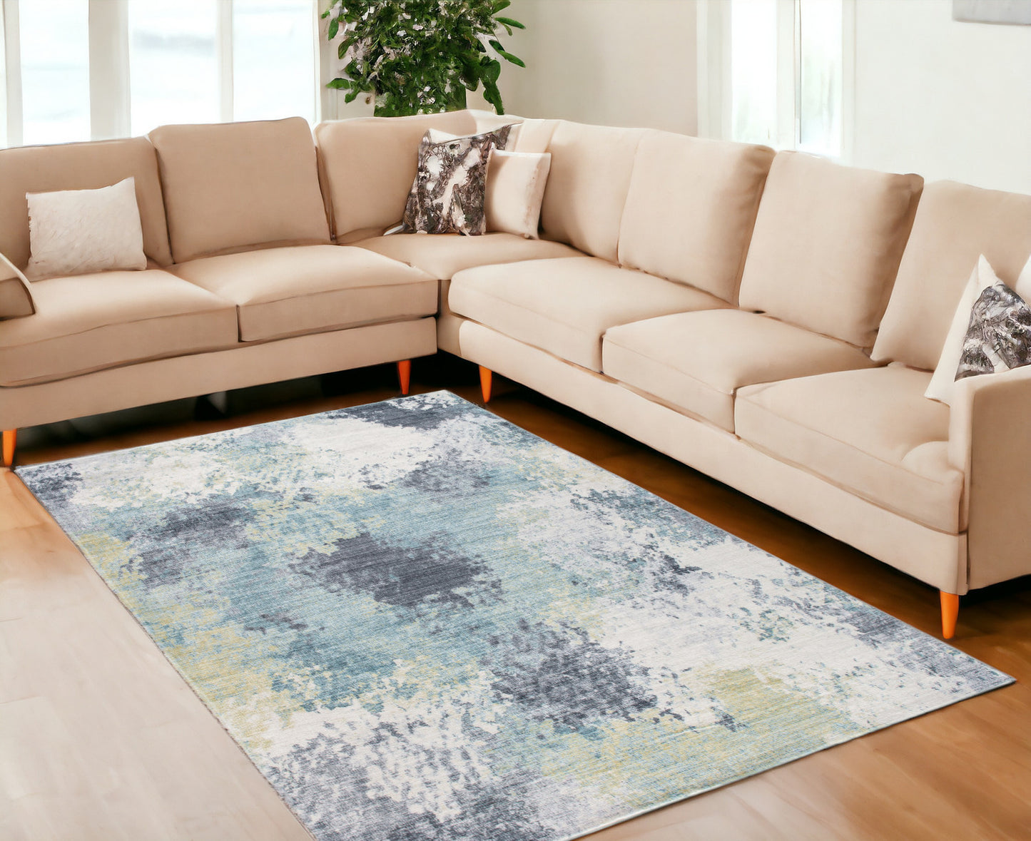 6' x 9' Blue and Ivory Abstract Area Rug