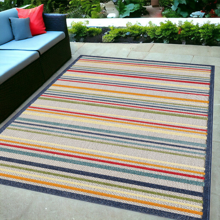 5' X 7' Ivory And Blue Striped Stain Resistant Indoor Outdoor Area Rug