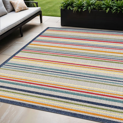 5' X 7' Ivory And Blue Striped Stain Resistant Indoor Outdoor Area Rug