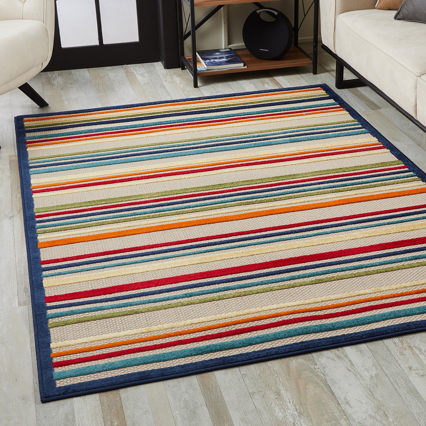 5' X 7' Ivory And Blue Striped Stain Resistant Indoor Outdoor Area Rug