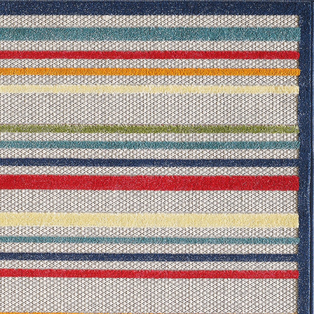 5' X 7' Ivory And Blue Striped Stain Resistant Indoor Outdoor Area Rug