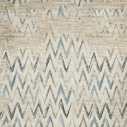 5' X 8' Ivory And Blue Chevron Area Rug