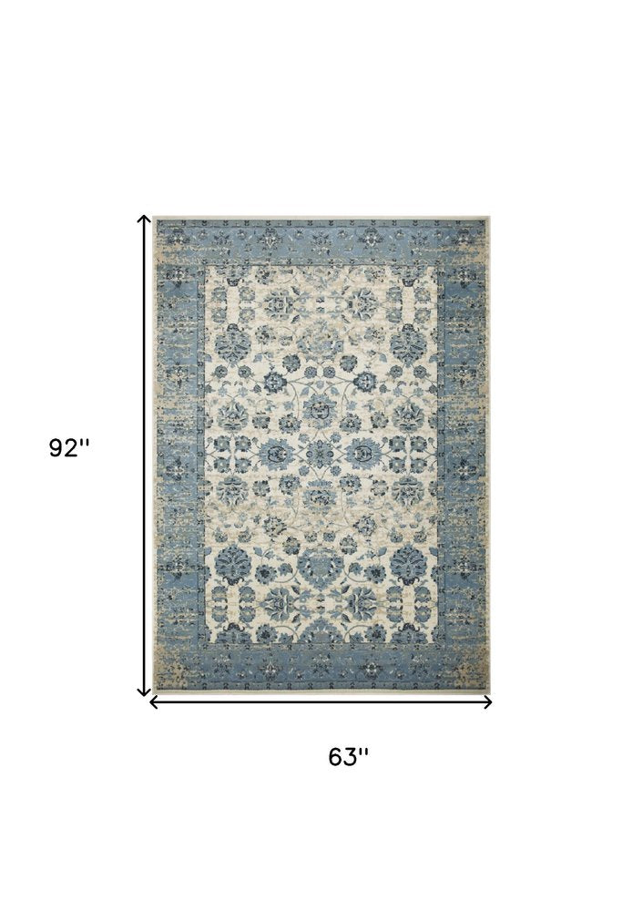 5' X 8' Ivory And Sky Blue Oriental Area Rug