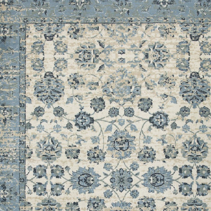 5' X 8' Ivory And Sky Blue Oriental Area Rug