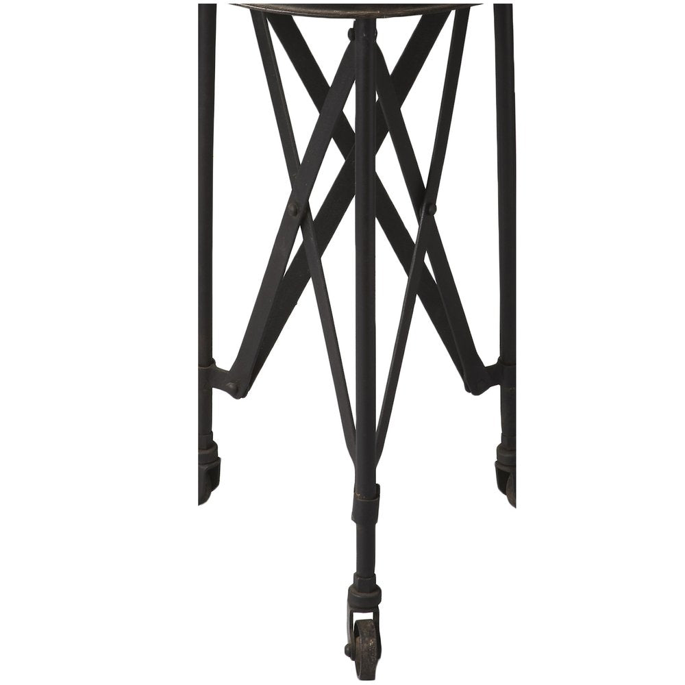 Black metal table base with crisscross X legs and caster wheels, industrial-style desk stand.