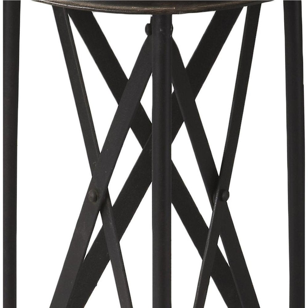 Black metal round-top side table with crisscross X-frame legs, industrial style.
