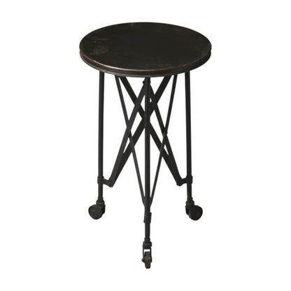 Round dark wood-top end table with black metal frame, intersecting cross braces, and caster wheels.