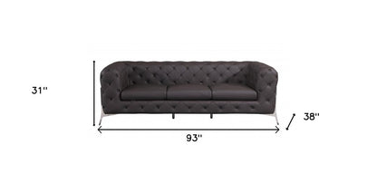 93" Brown Italian leather Chesterfield sofa with tufted upholstery and silver legs.