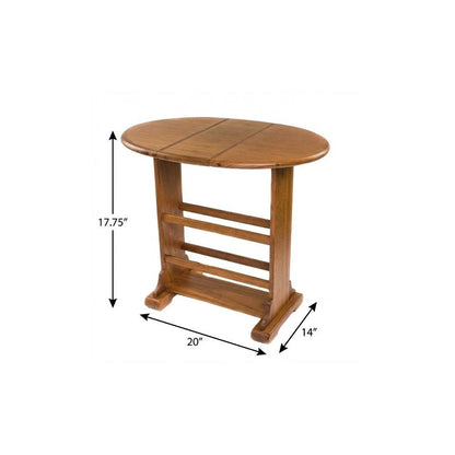 Warm brown solid wood oval end table with a slatted shelf and curved base; 17.75 in tall, 20 in diameter.
