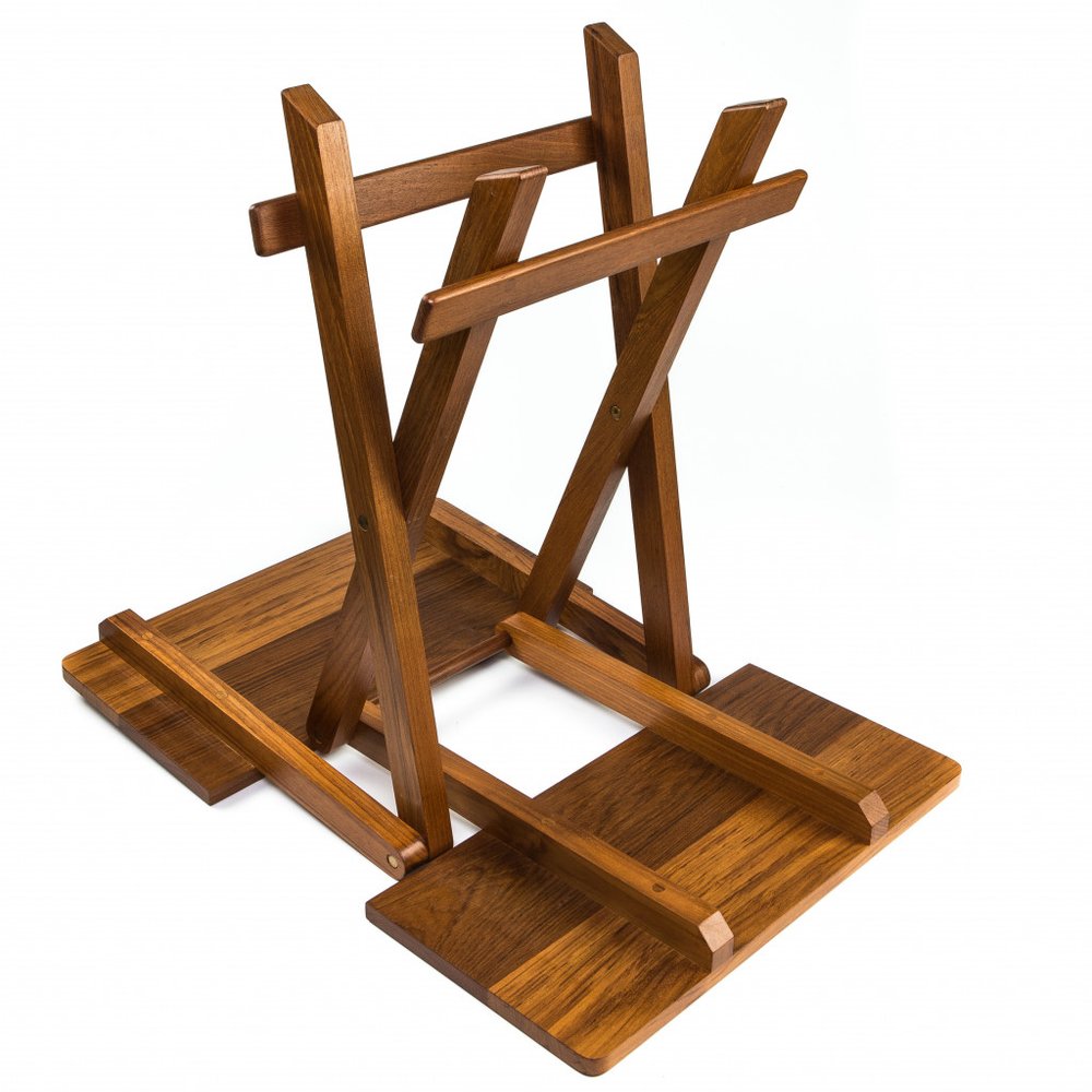 Brown wooden folding chair frame with cross-brace legs.