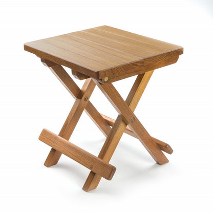 Natural wood folding side table with square top and crossed X-frame legs.