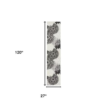 10' Black And White Indoor Outdoor Runner Rug
