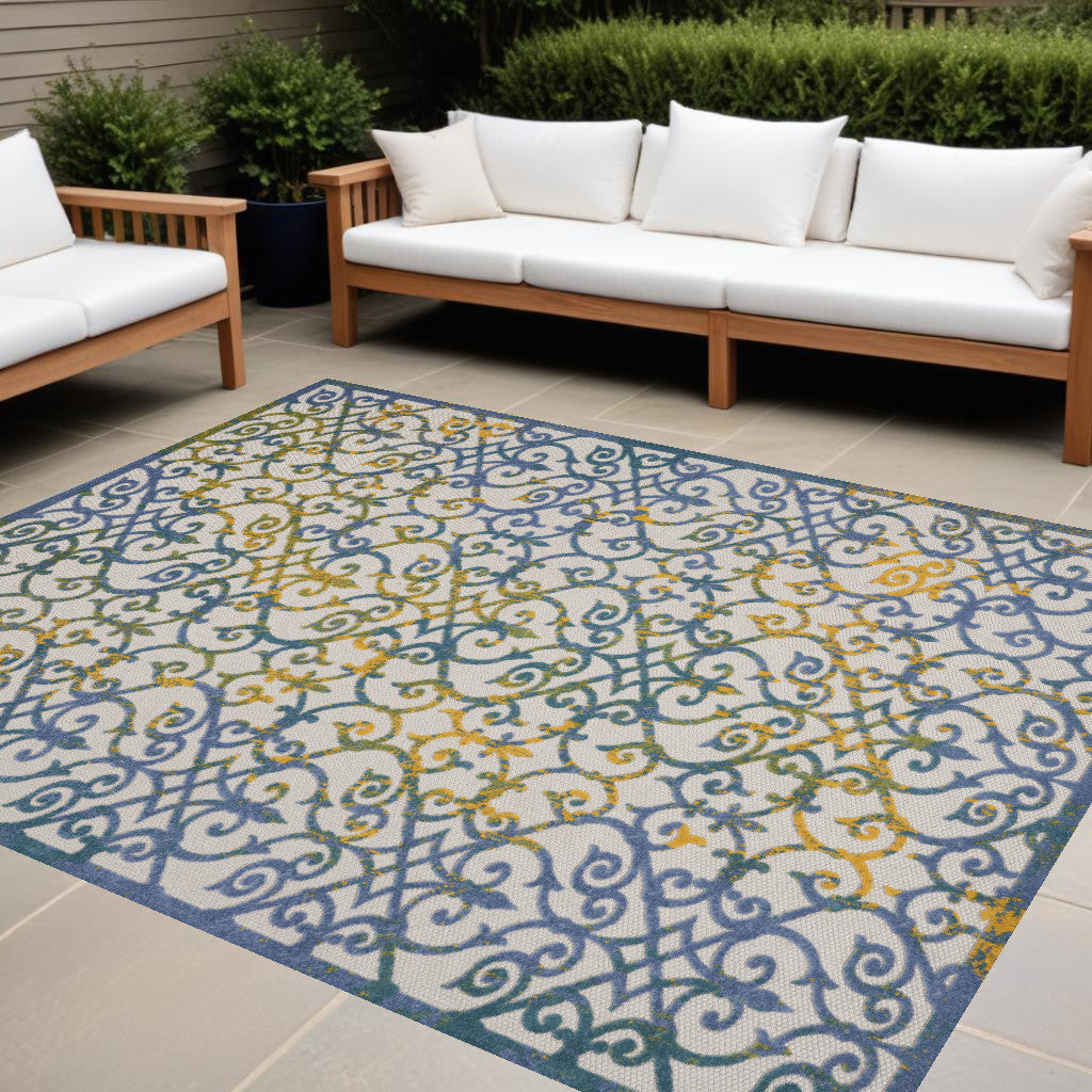 12' X 15' Ivory And Blue Damask Non Skid Indoor Outdoor Area Rug