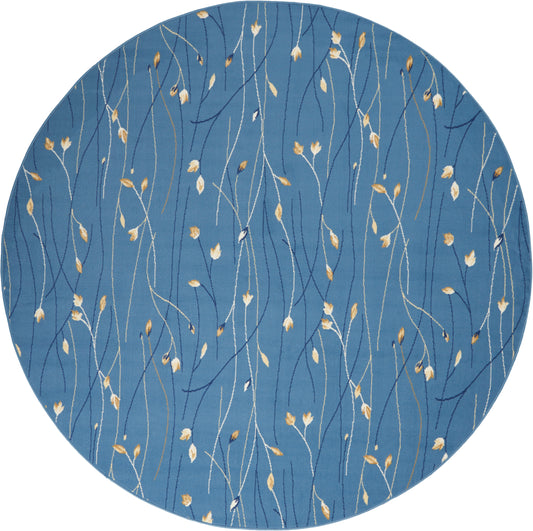 Round blue rug with delicate white and gold wavy vines and small leaf accents.