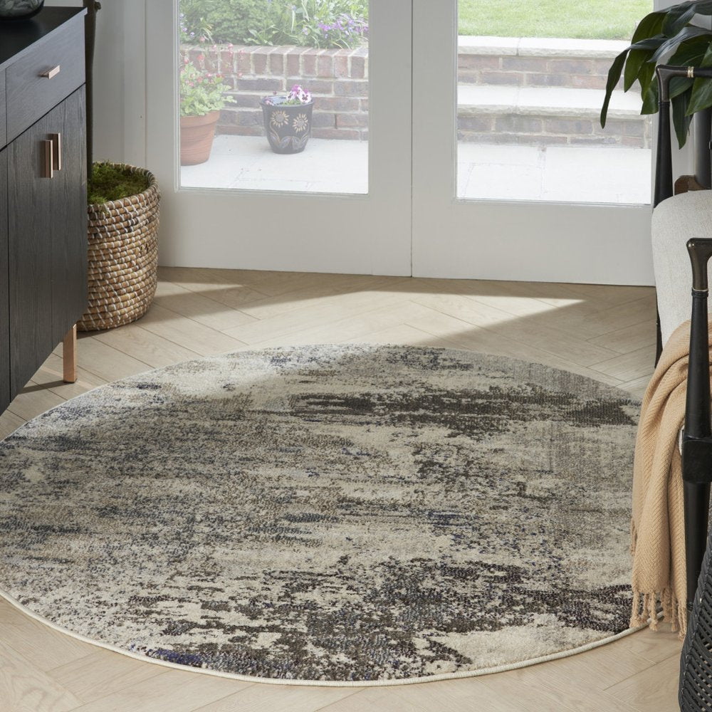 5' X 5' Ivory And Grey Round Abstract Power Loom Non Skid Area Rug