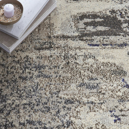 5' X 5' Ivory And Grey Round Abstract Power Loom Non Skid Area Rug