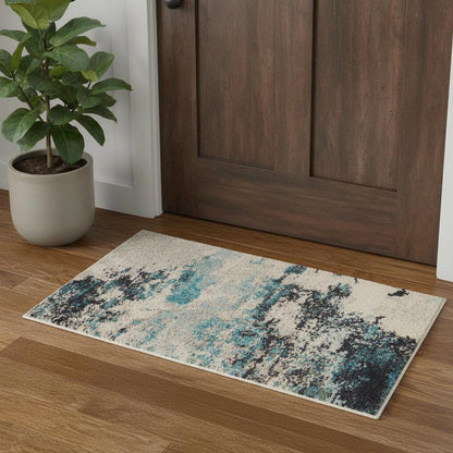 2' X 4' Ivory And Teal Blue Abstract Power Loom Non Skid Area Rug