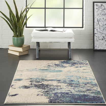 3' X 5' Ivory And Teal Blue Abstract Power Loom Non Skid Area Rug