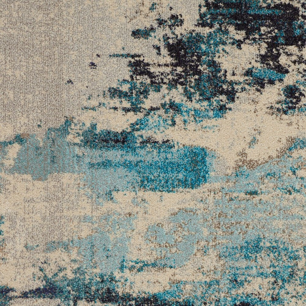 4' X 6' Ivory And Teal Blue Abstract Power Loom Non Skid Area Rug