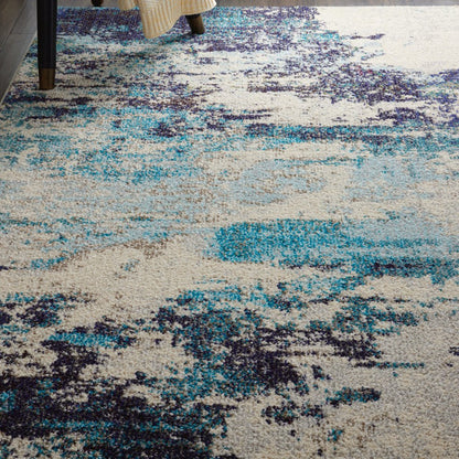 4' X 6' Ivory And Teal Blue Abstract Power Loom Non Skid Area Rug