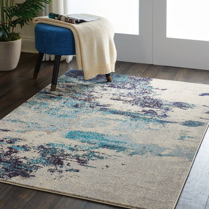 4' X 6' Ivory And Teal Blue Abstract Power Loom Non Skid Area Rug