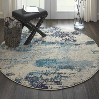 4' X 4' Ivory And Teal Blue Round Abstract Power Loom Non Skid Area Rug