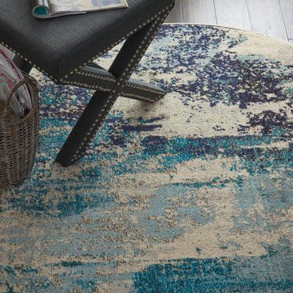 4' X 4' Ivory And Teal Blue Round Abstract Power Loom Non Skid Area Rug