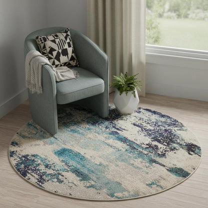5' X 5' Ivory And Teal Blue Round Abstract Power Loom Non Skid Area Rug