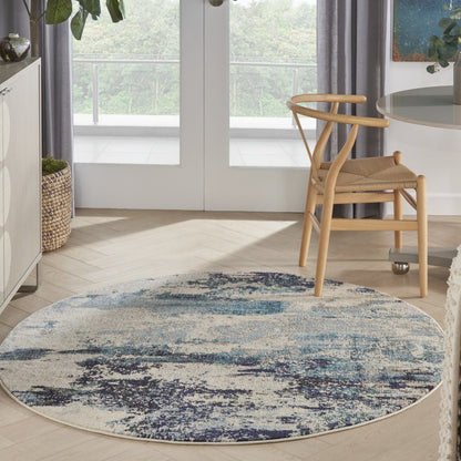 5' X 5' Ivory And Teal Blue Round Abstract Power Loom Non Skid Area Rug