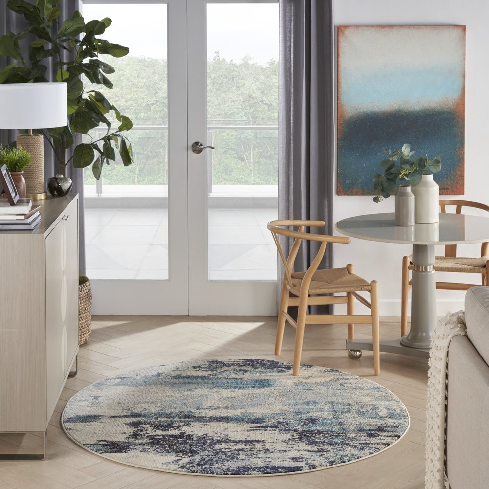 5' X 5' Ivory And Teal Blue Round Abstract Power Loom Non Skid Area Rug