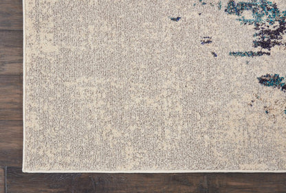 5' X 7' Ivory And Teal Blue Abstract Power Loom Non Skid Area Rug