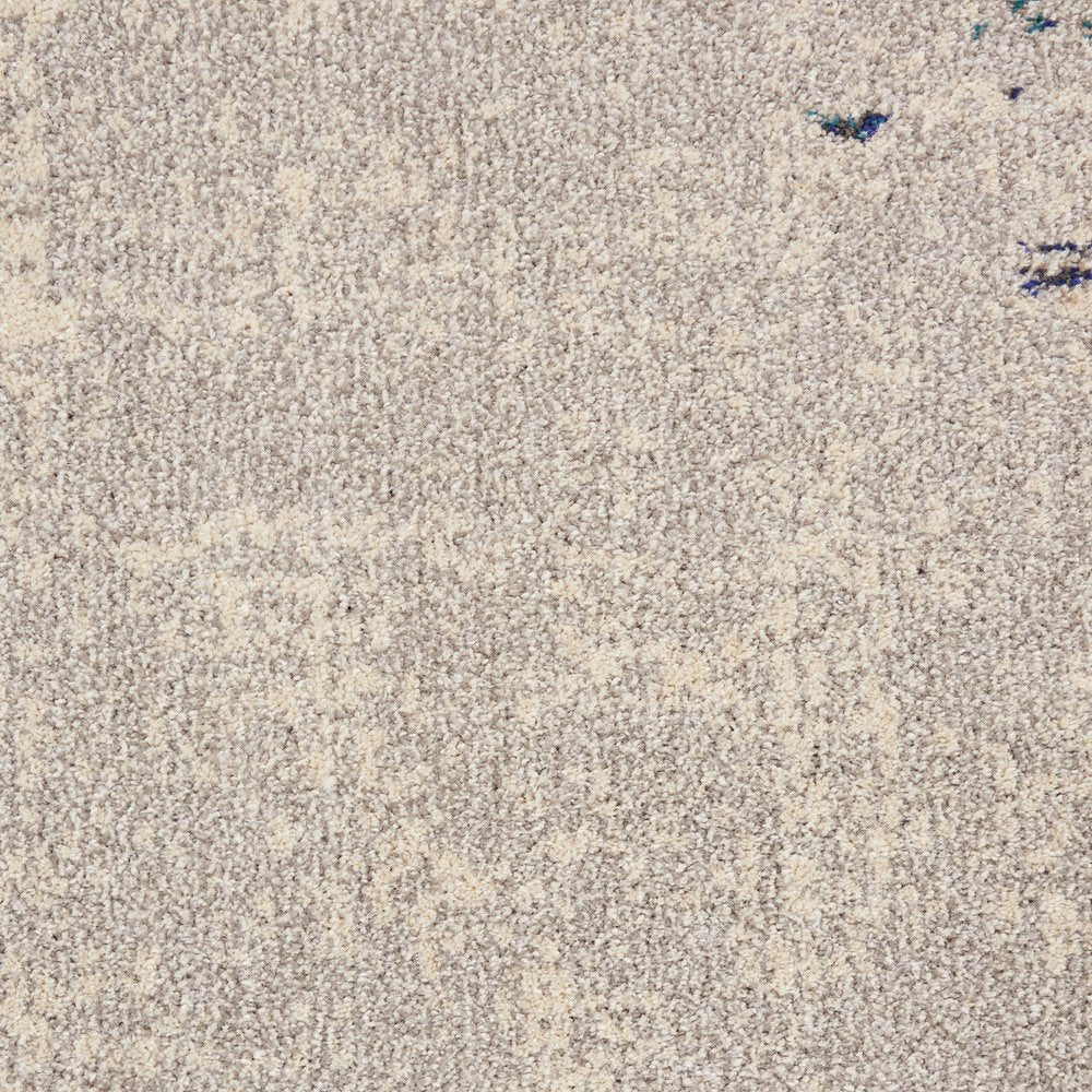 5' X 7' Ivory And Teal Blue Abstract Power Loom Non Skid Area Rug