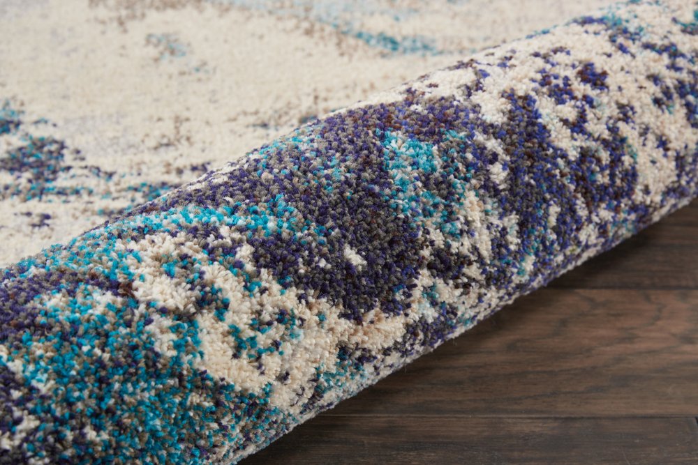 5' X 7' Ivory And Teal Blue Abstract Power Loom Non Skid Area Rug