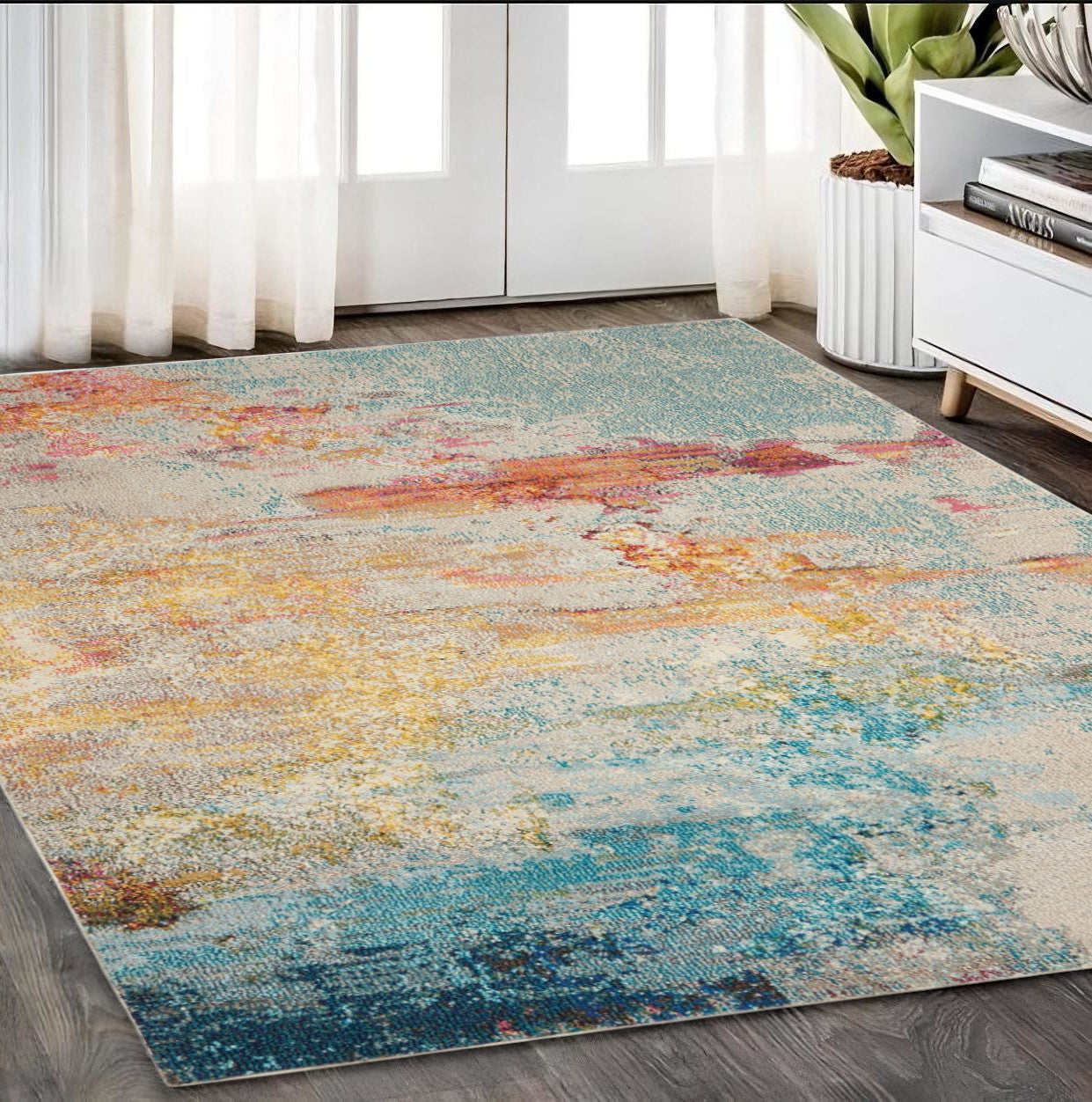 5' X 7' Blue and Orange Abstract Power Loom Area Rug