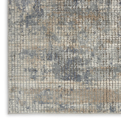 3' X 5' Blue And Beige Abstract Power Loom Distressed Non Skid Area Rug