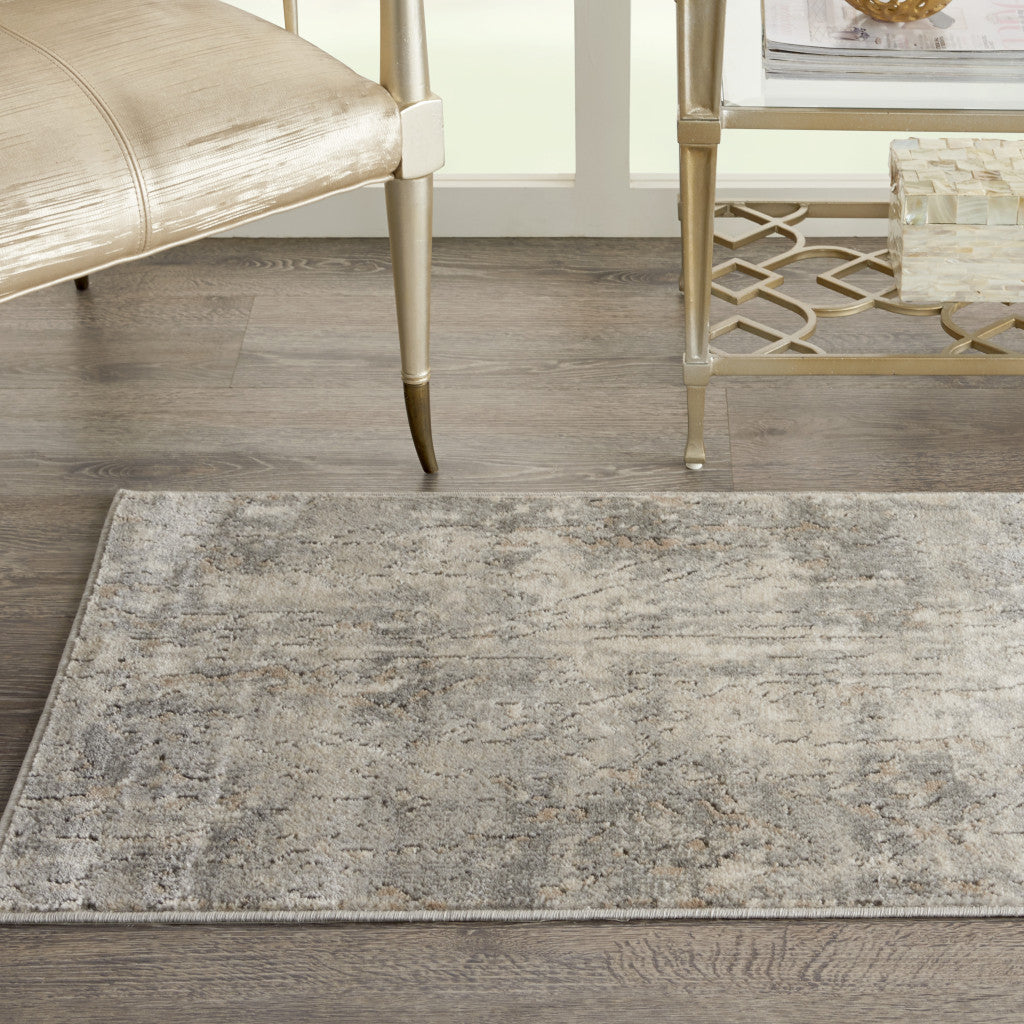 2' X 4' Beige And Grey Abstract Power Loom Non Skid Area Rug