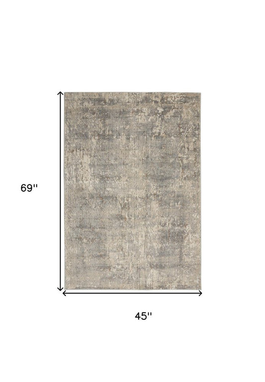 4' X 6' Beige And Grey Abstract Power Loom Non Skid Area Rug