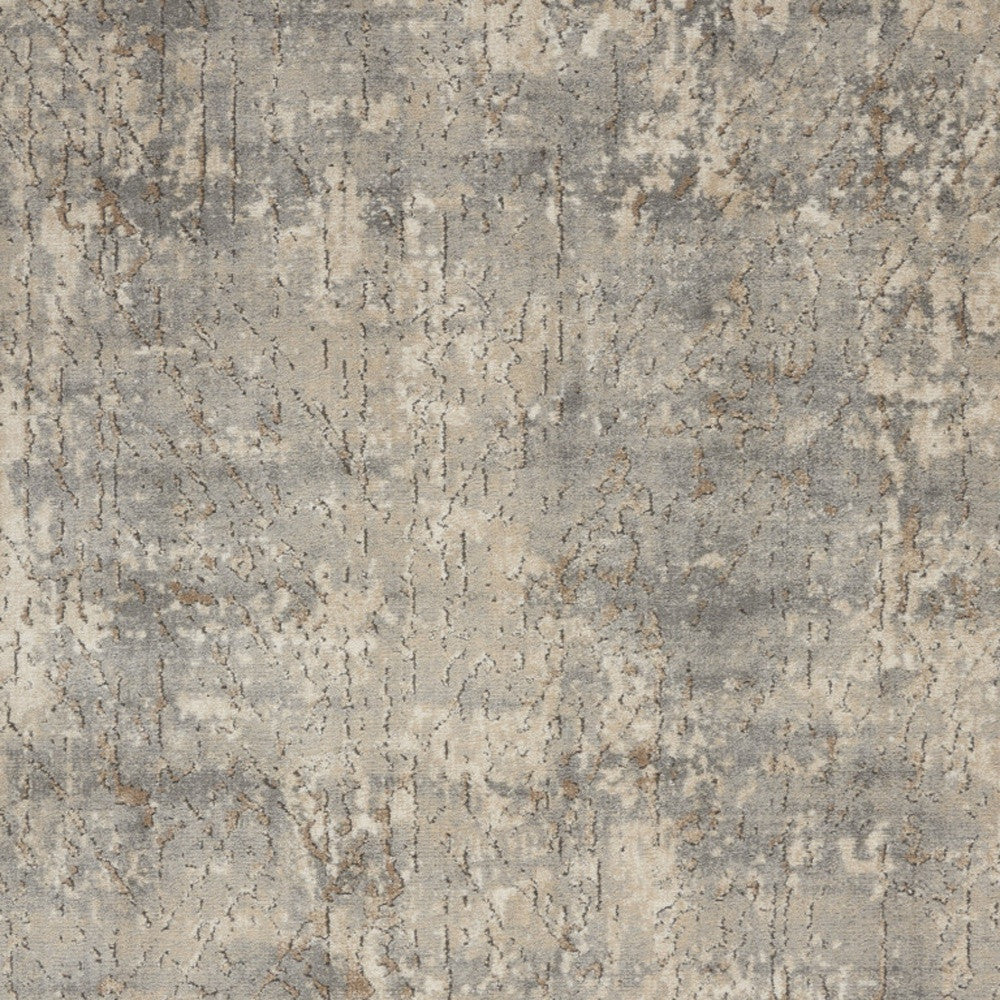 5' X 7' Beige And Grey Abstract Power Loom Non Skid Area Rug