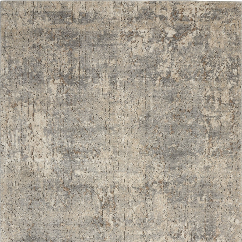 5' X 7' Beige And Grey Abstract Power Loom Non Skid Area Rug