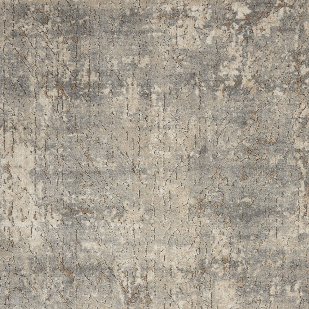 5' X 7' Beige And Grey Abstract Power Loom Non Skid Area Rug