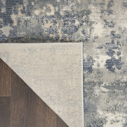2' X 4' Beige And Gray Abstract Distressed Area Rug