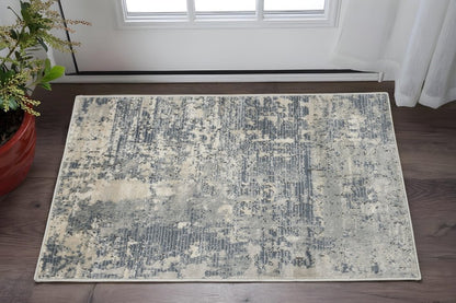 2' X 4' Beige And Gray Abstract Distressed Area Rug