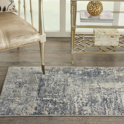 2' X 4' Beige And Gray Abstract Distressed Area Rug
