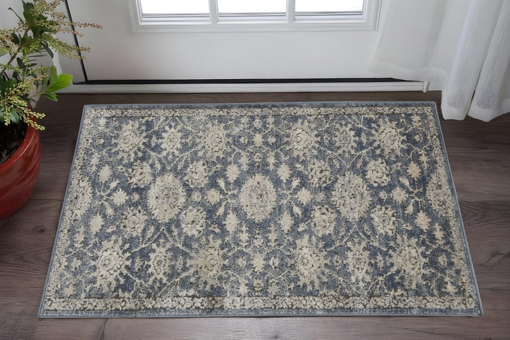 2' X 4' Blue And Beige Oriental Distressed Area Rug